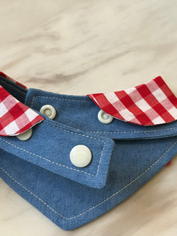 denim bib with red plaid pattern